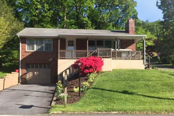 Brick split level home with a covered front porch in Marysville, Pennsylvania