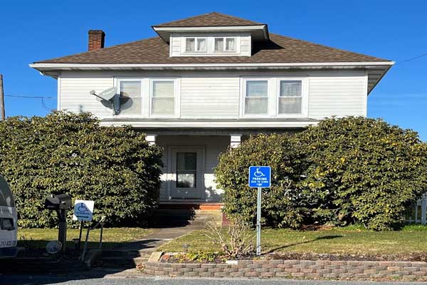 White two story home with a front porch in Valley View, Pennsylvania